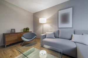 Modern-Loft-Room-with-Grey-Sofa-and-Big-Floor-Lamp